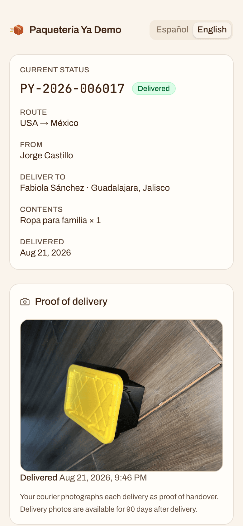 A public tracking page on a phone showing a delivered package with its proof of delivery photo.